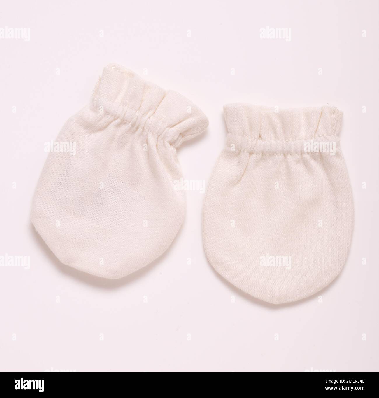 Baby mitten hi res stock photography and images Alamy
