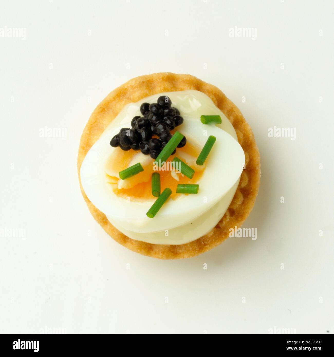Quail’s eggs, caviar and chives croustade Stock Photo - Alamy
