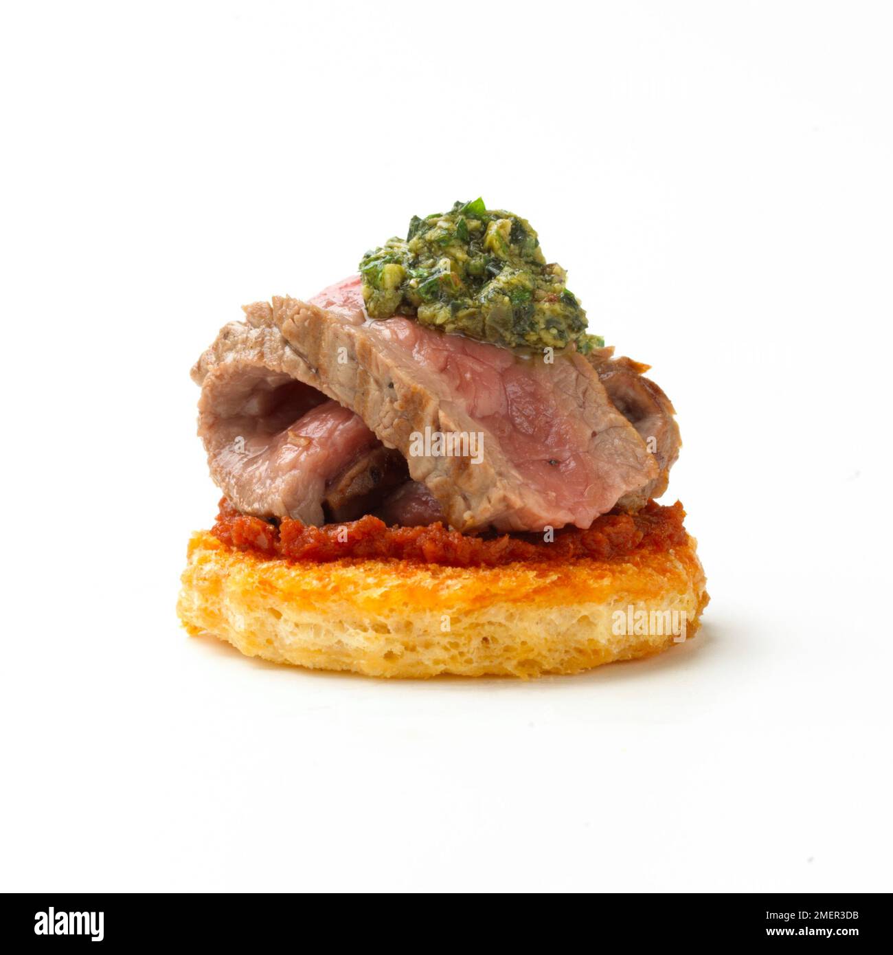 Grilled beef croute with salsa verde, canape Stock Photo Alamy