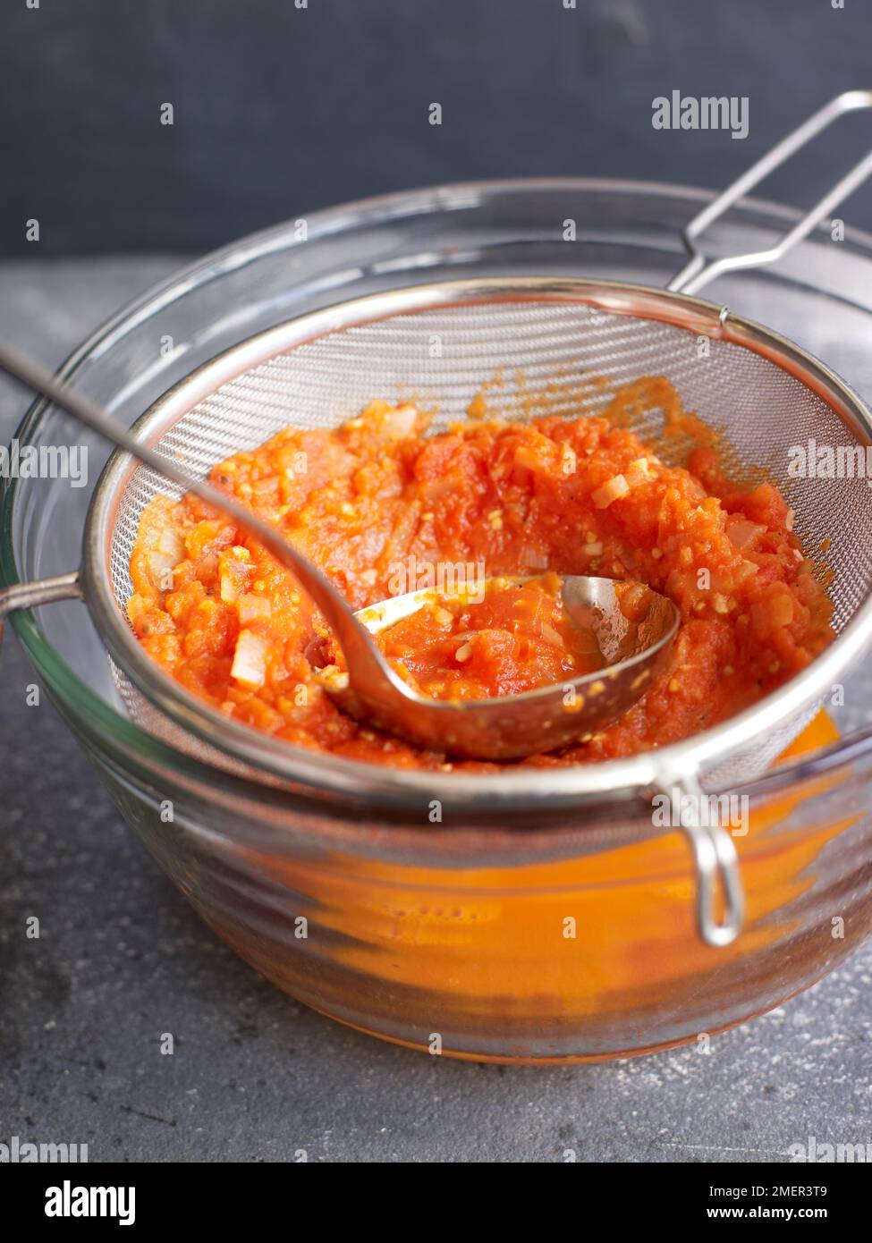 Tomato strainer hi-res stock photography and images - Alamy