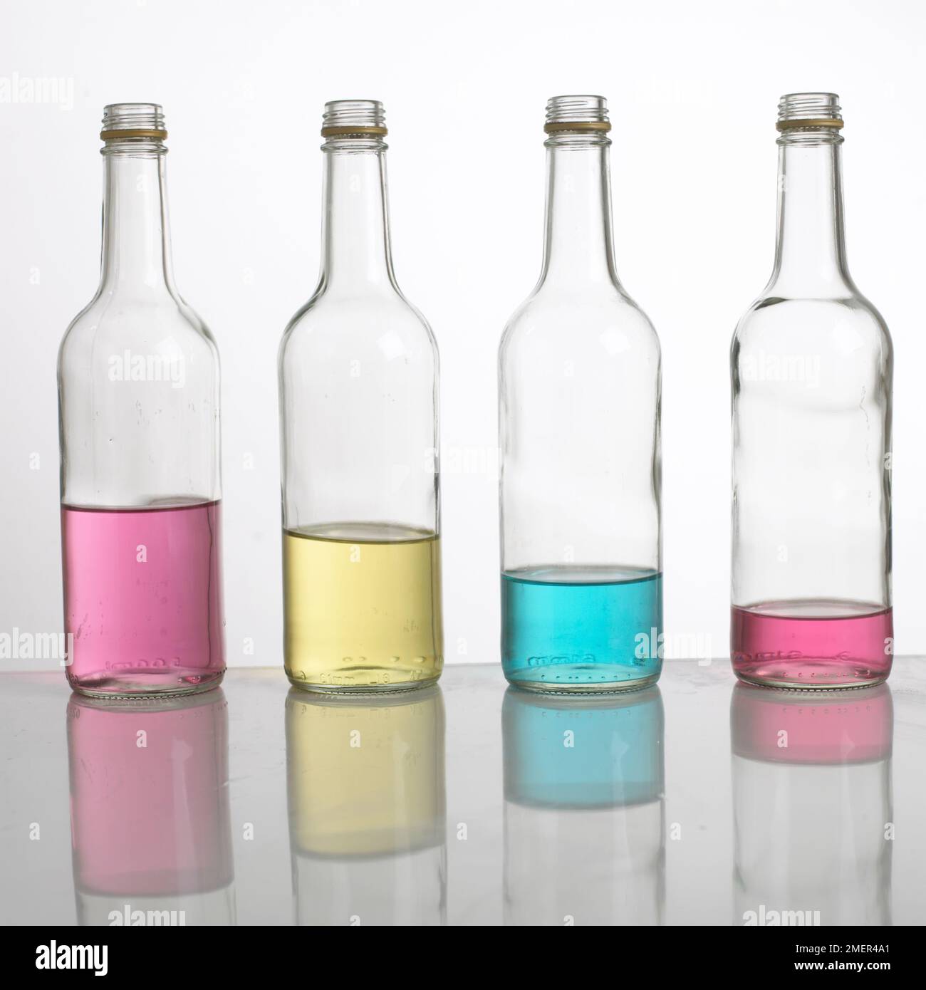 'Bottle pipes' or 'bottle xylophone', four bottles filled with