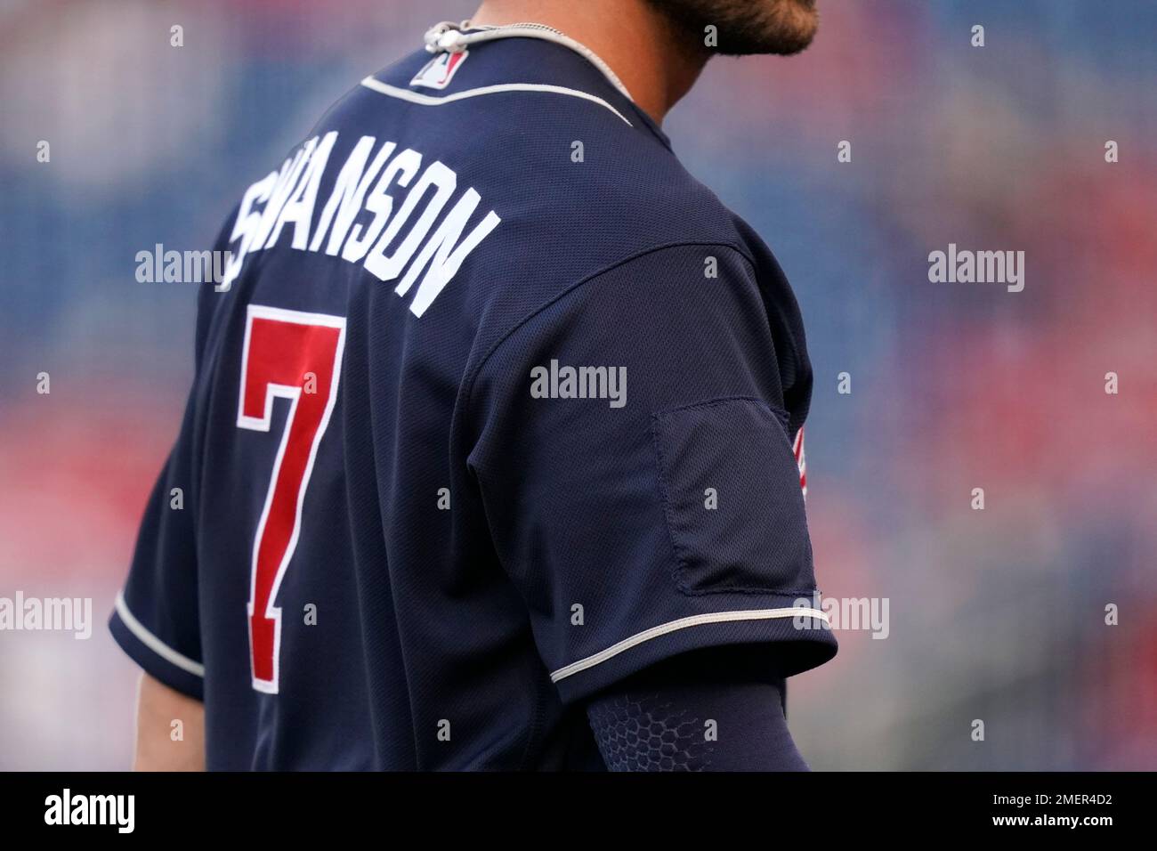 Cloth covers up a 2021 All Star Game patch on Atlanta Braves shortstop  Dansby Swanson's jersey in the eighth inning of an opening day baseball  game against the Washington Nationals at Nationals