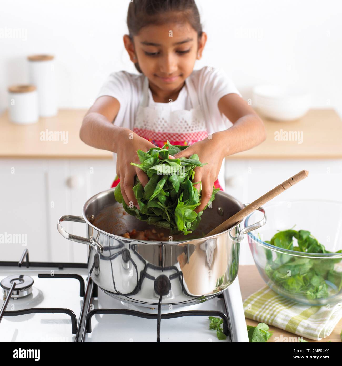 Child pot stove hi-res stock photography and images - Alamy