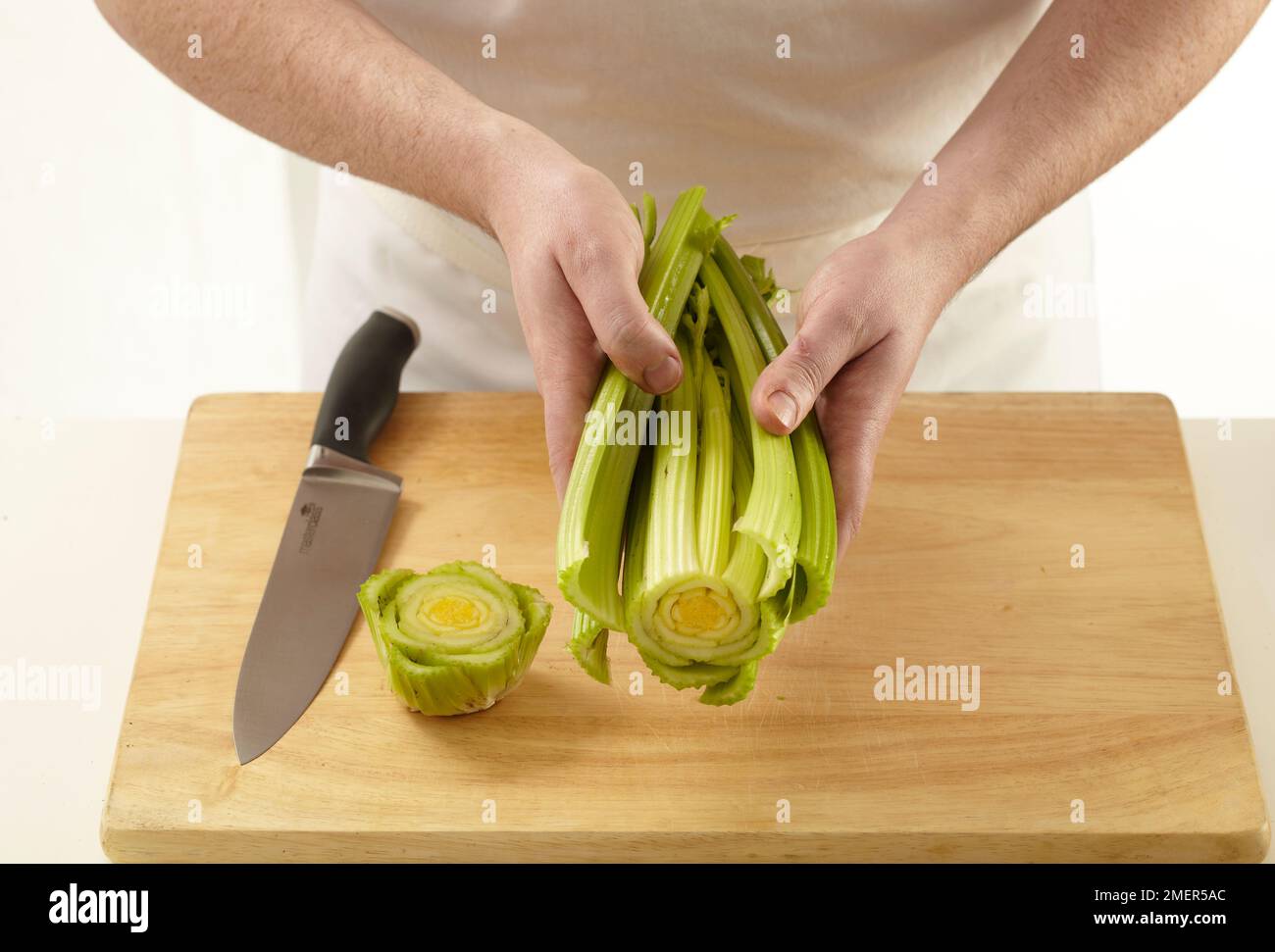 Handful of cut celery stalks Stock Photo