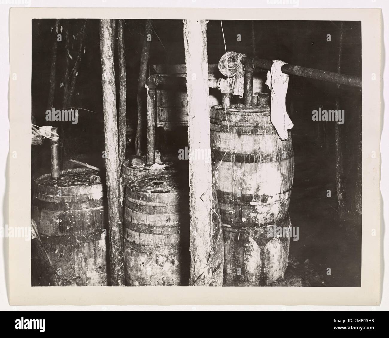 Illicit still. This image depicts an illicit distillery located by the