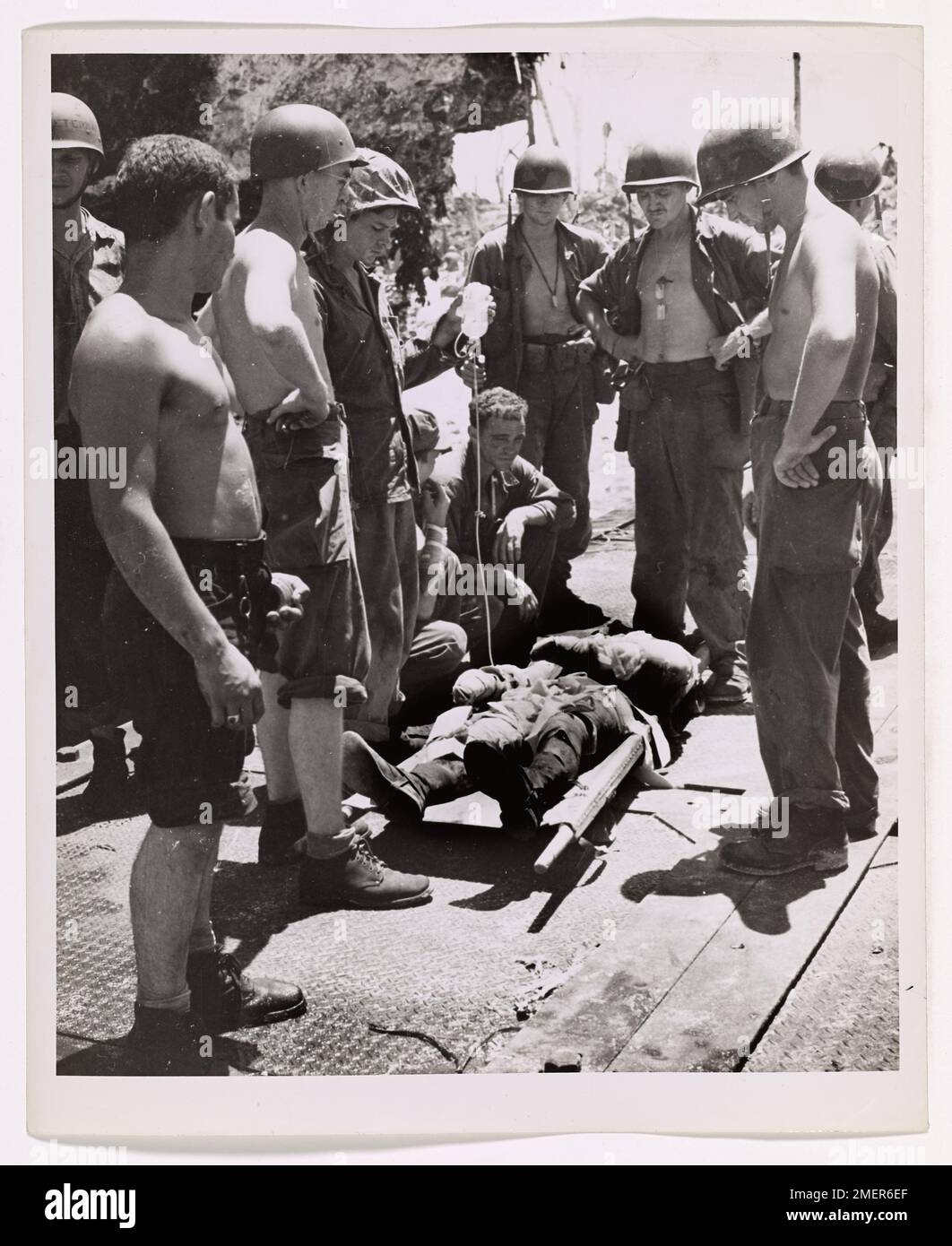 Wounded man on stretcher hi-res stock photography and images - Alamy