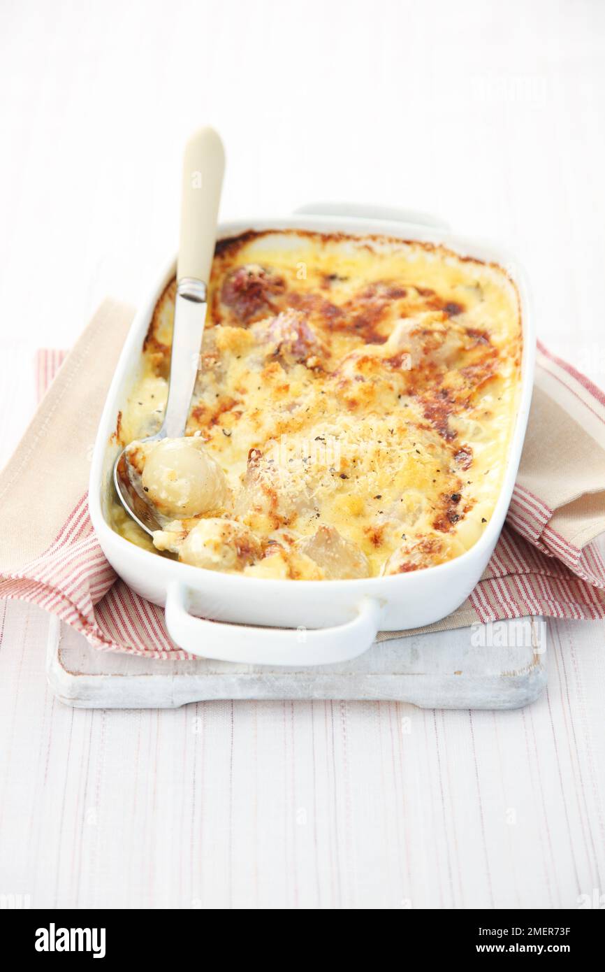 Baked shallots in cream sauce Stock Photo