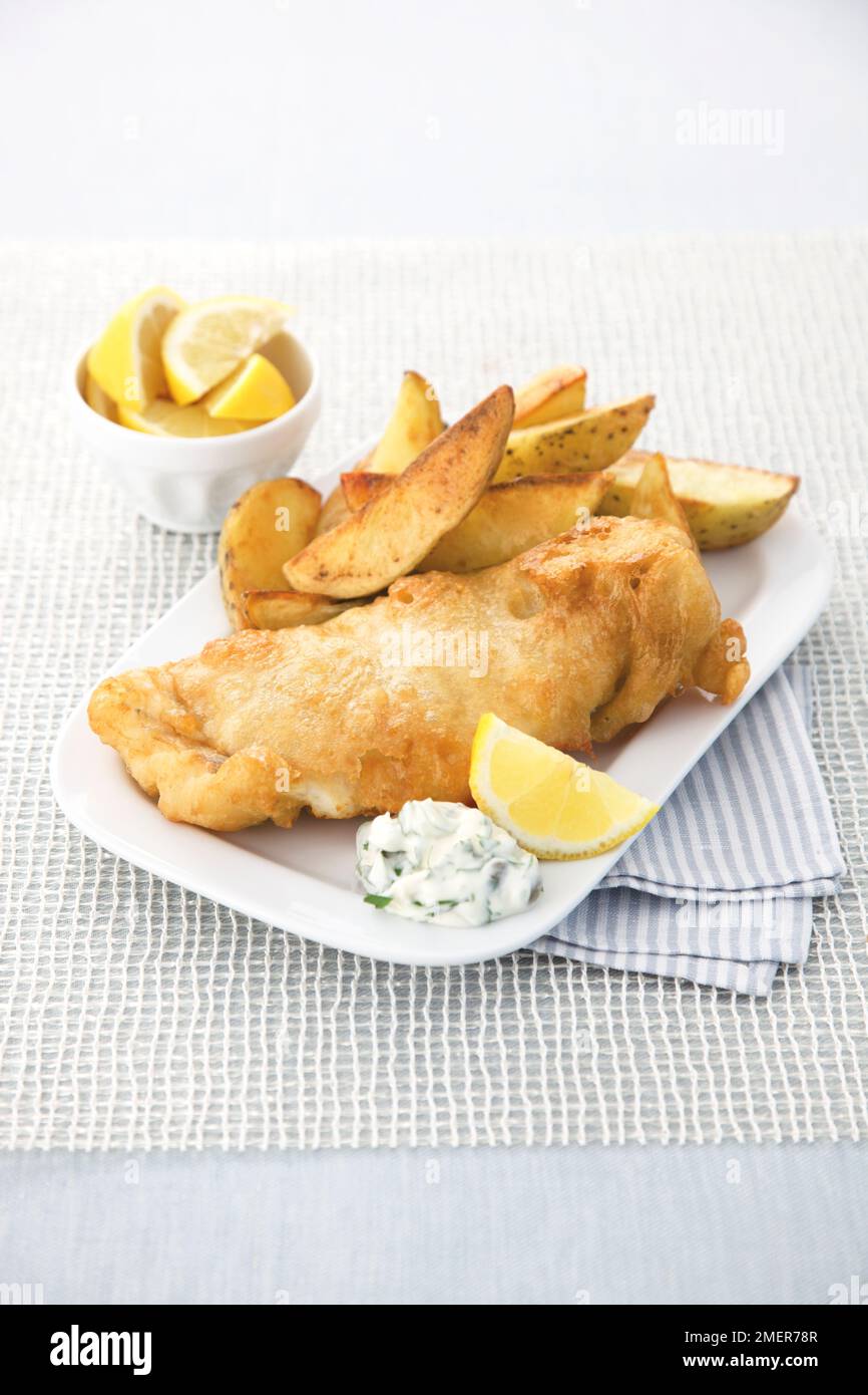 Battered fish and chips with tartar sauce Stock Photo Alamy