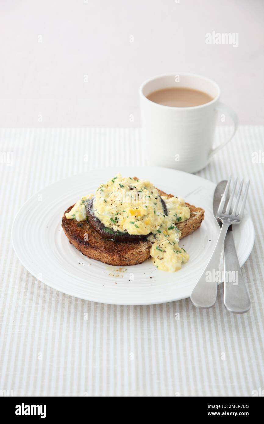 Portobello mushroom and scrambled egg on toast Stock Photo Alamy