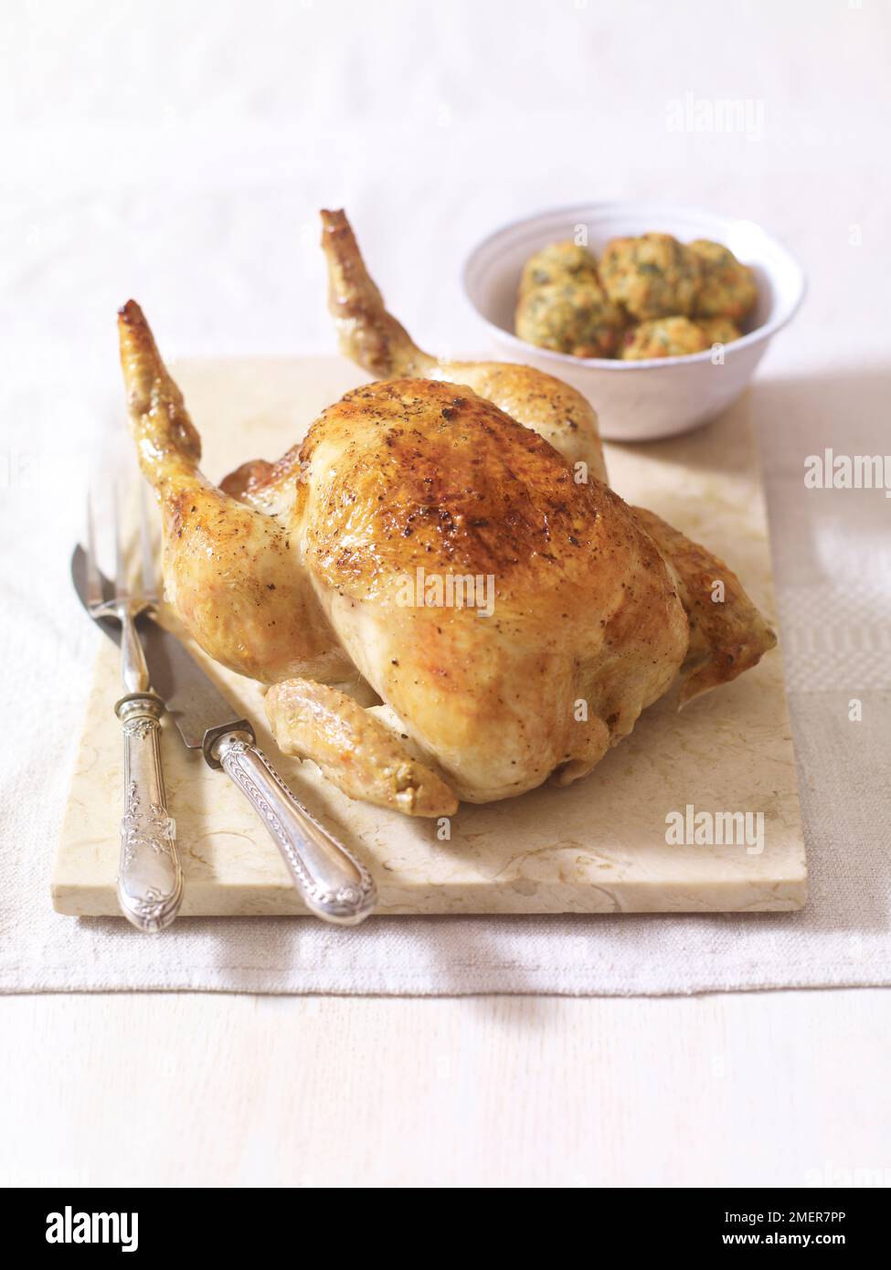 Roast chicken and stuffing balls Stock Photo Alamy