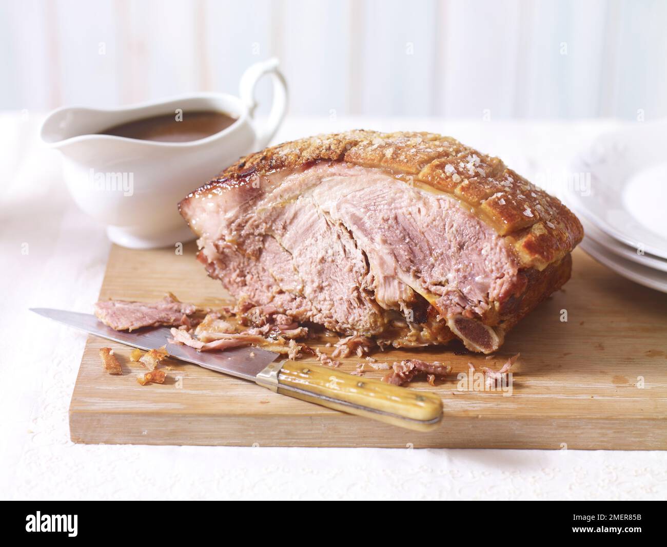 Slow cooked roast pork shoulder on board Stock Photo Alamy