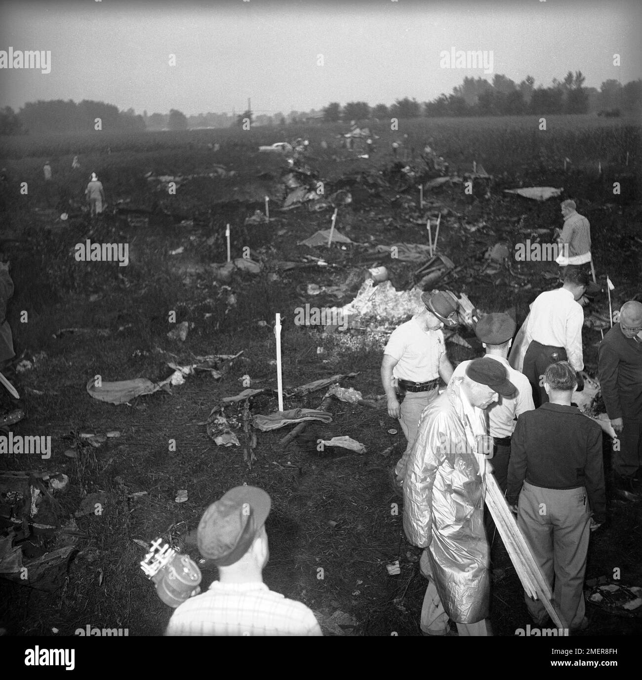 Wreckage of the TWA passenger plane - stakes marking strewn bodies 