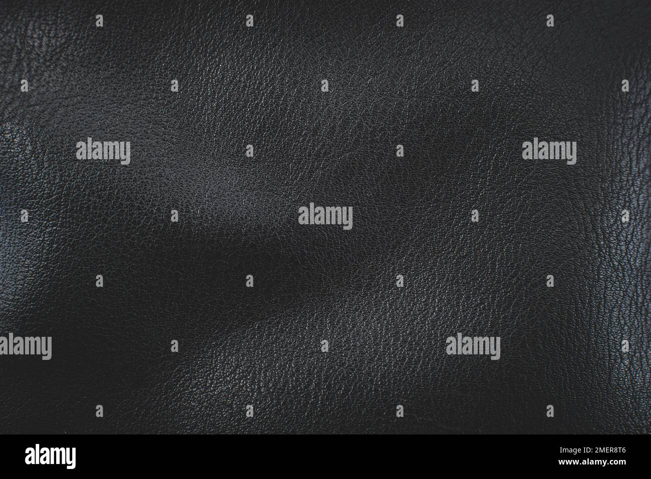 Black artificial leather texture close up. Leather Stock Photo