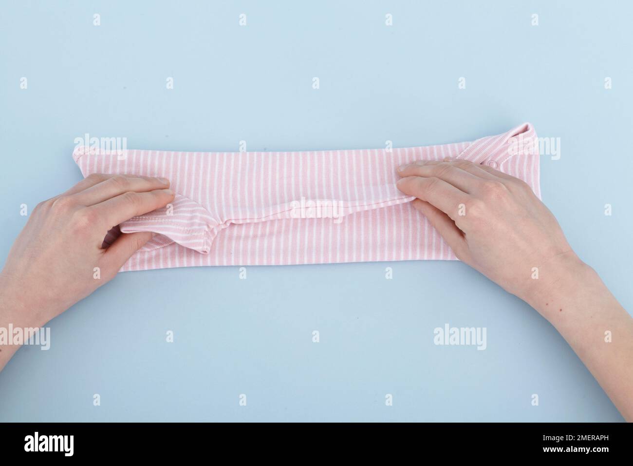 Folding baby vest Stock Photo Alamy