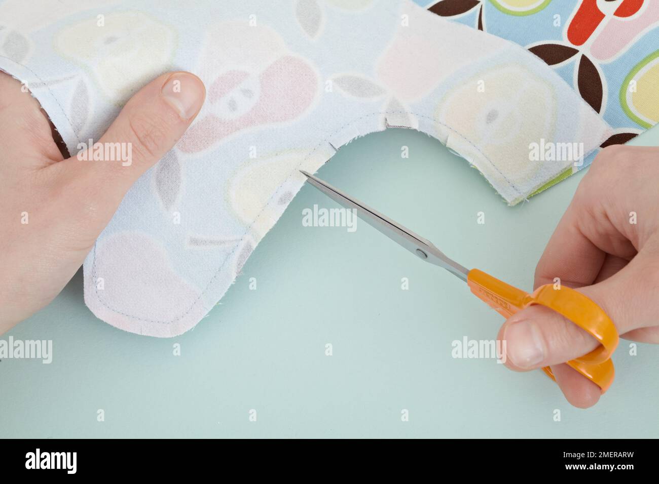 Make a summer dress, clip into seam allowance Stock Photo Alamy