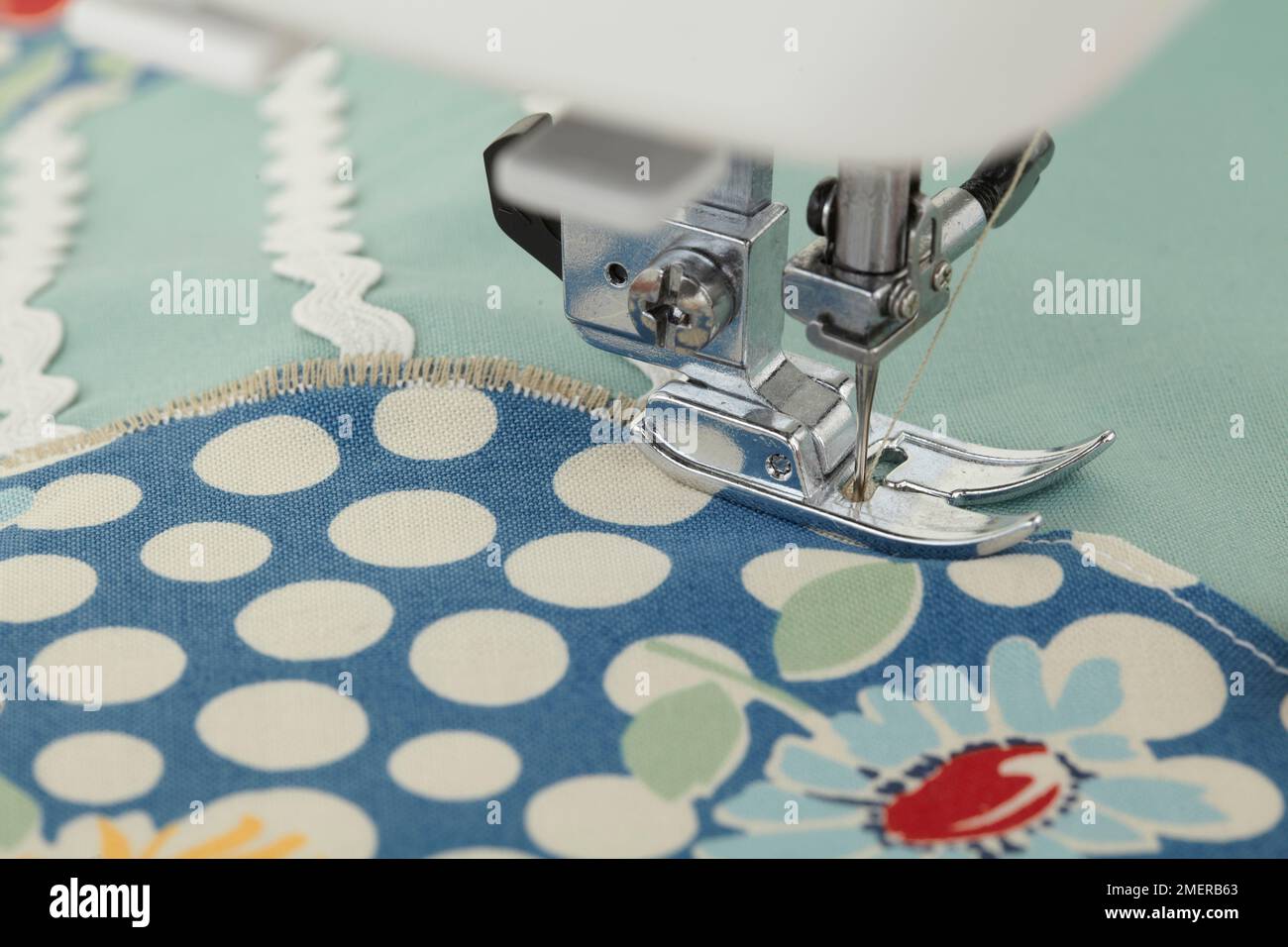 Sew zigzag decorative edge on cushion Stock Photo Alamy