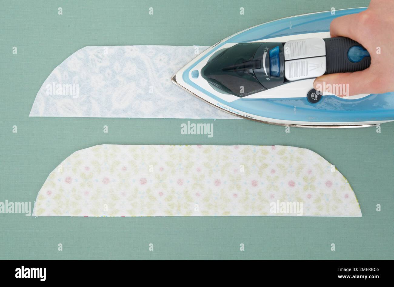 Making a ironing interfacing, above shot Stock Photo Alamy