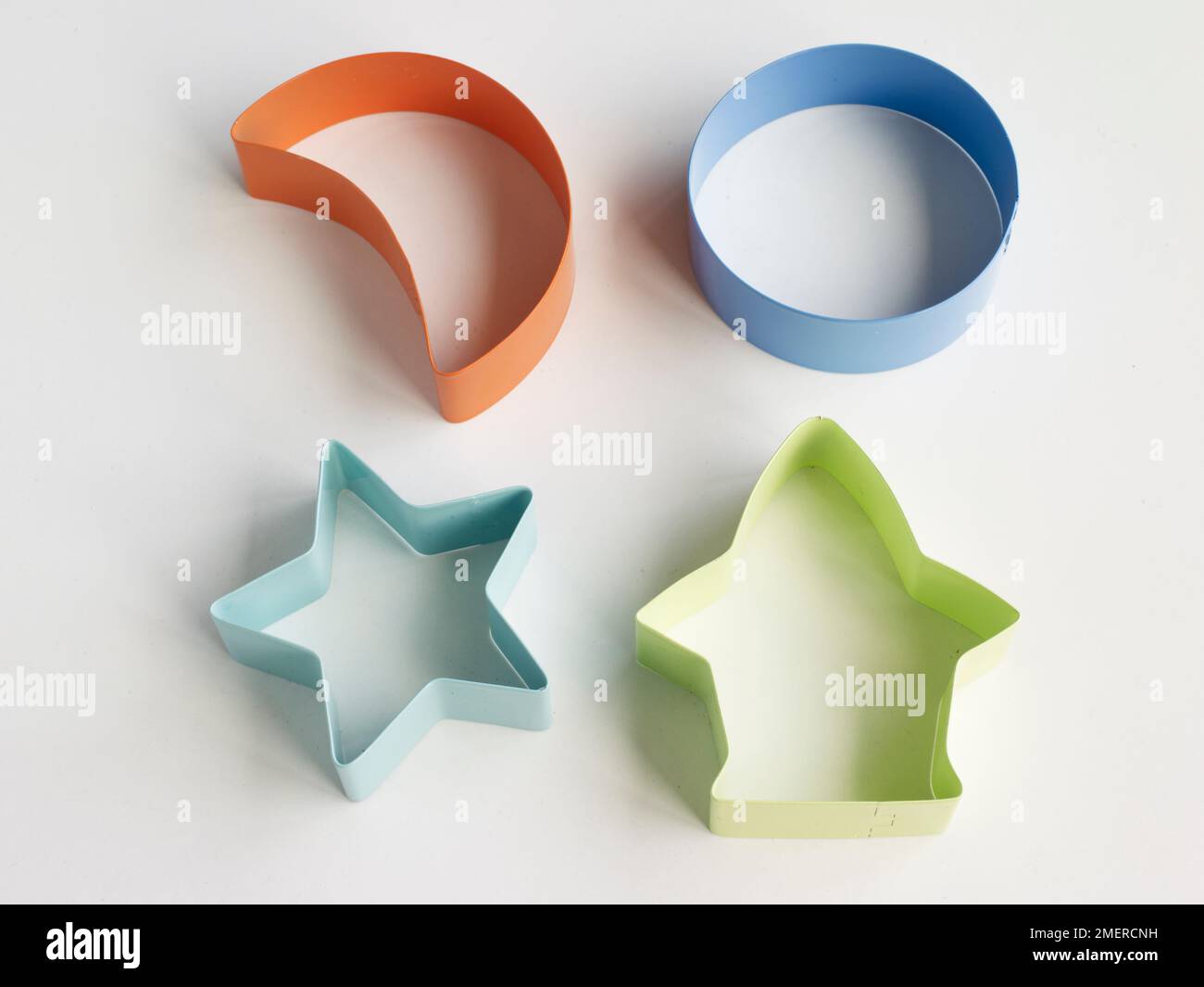 Four plastic cookie cutters Stock Photo Alamy