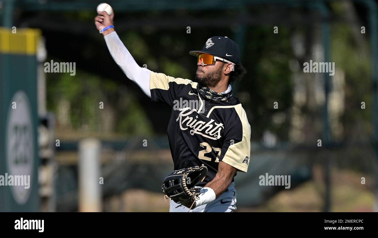 Central Florida outfielder Gephry Pena (27) throws during an NCAA college  baseball game against South Florida on Thursday, April 1, 2021, in Tampa,  Fla. (AP Photo/Phelan M. Ebenhack Stock Photo - Alamy