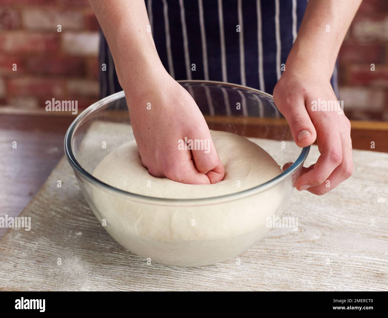 Dough punching hires stock photography and images Alamy
