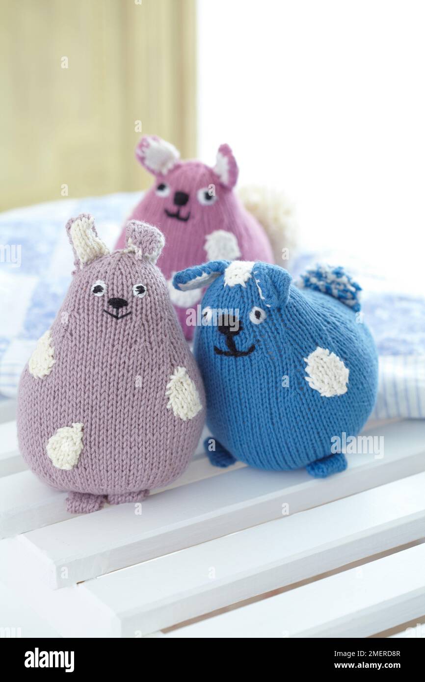 Soft knitted animal toys, 10 months Stock Photo