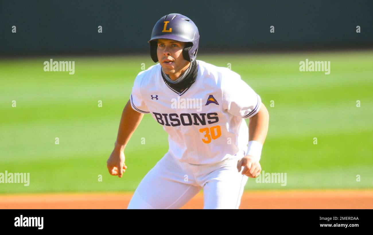 Chris Bashlor leads off first base during an NCAA baseball