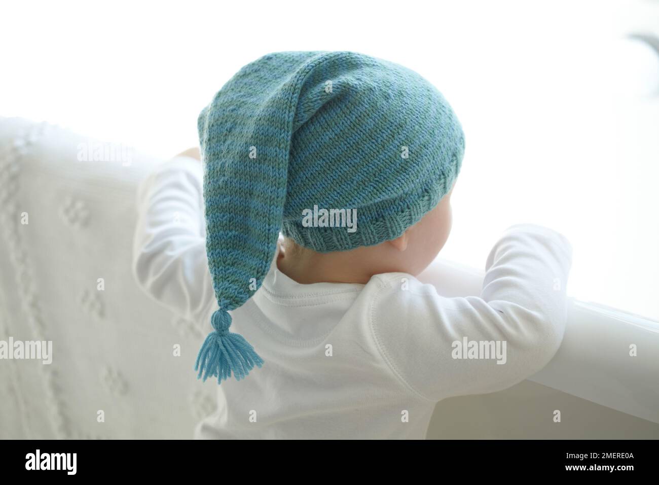 Boy wearing long knitted hat, 17 months Stock Photo