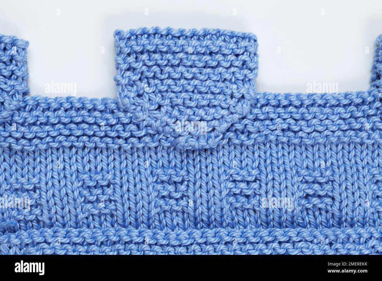 Top of blue knitted toy organiser Stock Photo