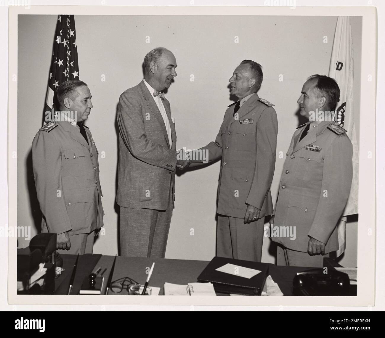 Congressman Shelby is rep. of 5th Dist. San Francisco, California. Swearing-in of Congressman John Shelby as CDR(T) USCGR. Cong Shelby (left) taking oath from VADM Merlin O'Neill, Commandant at Washington, D.C. Hq. Stock Photo