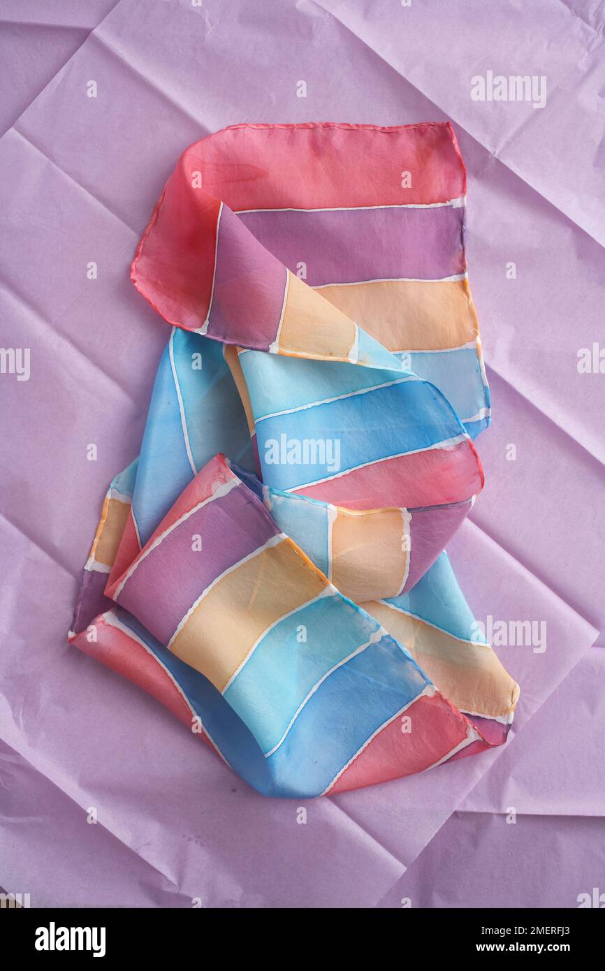 Painted silk scarf Stock Photo