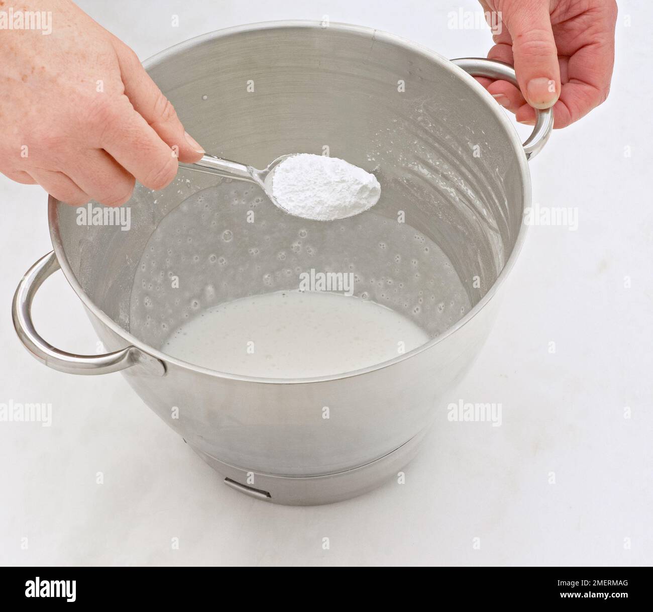 Mixing royal icing Stock Photo Alamy