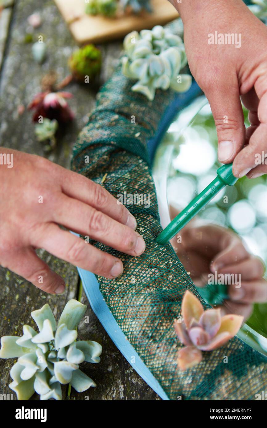 Using A Dibber Wreath mirror frame, living mirror frame, using a dibber to pierce ...