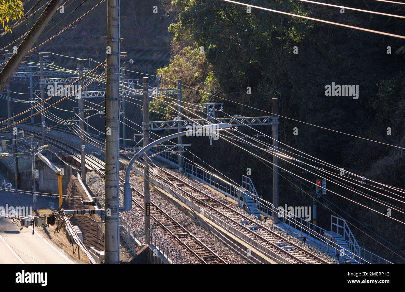 High voltage electrical wires over empty train tracks Stock Photo Alamy