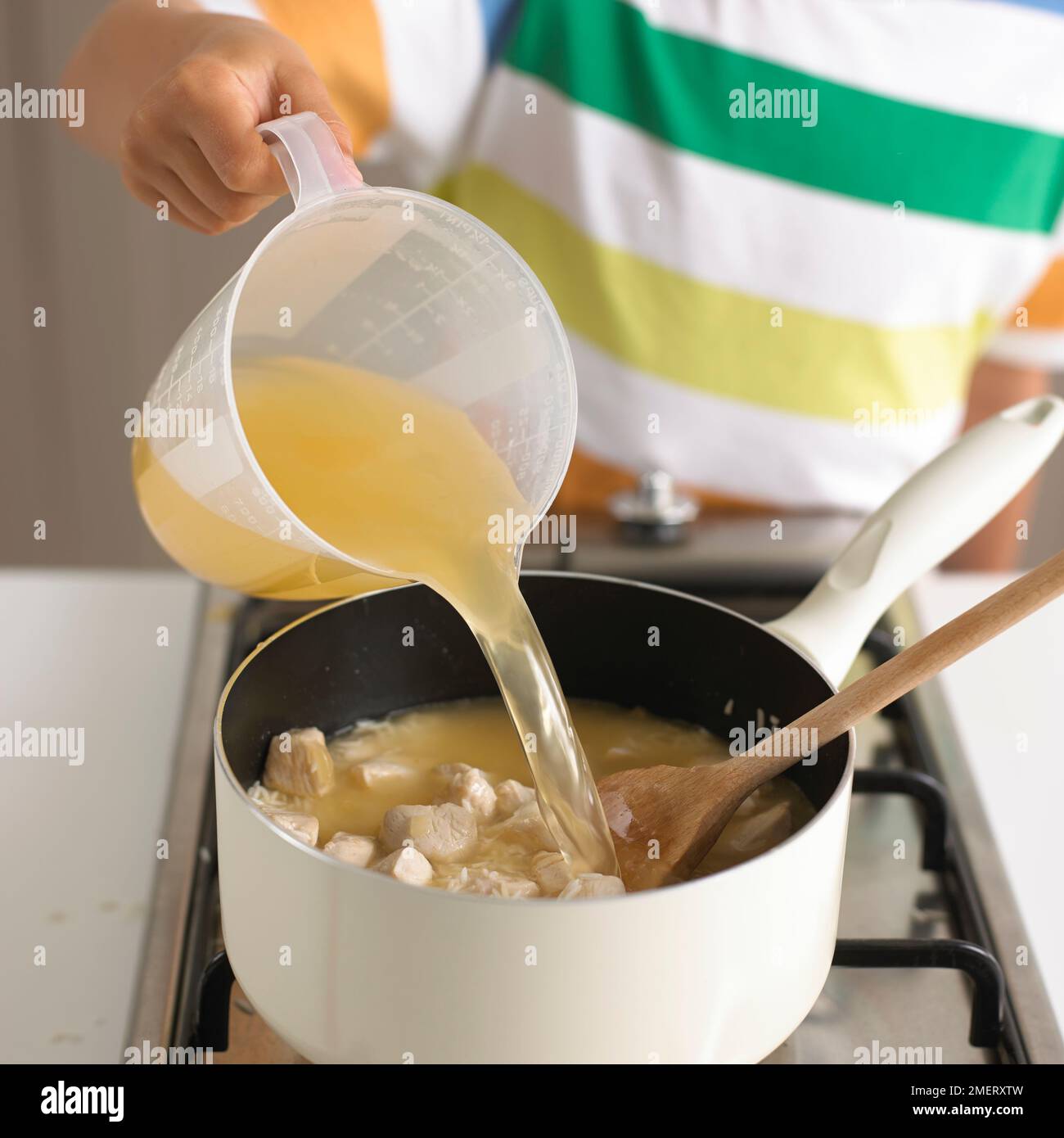 Chicken Stock in Clear Glass Jug Stock Photo by ©TravellingLight 203503932