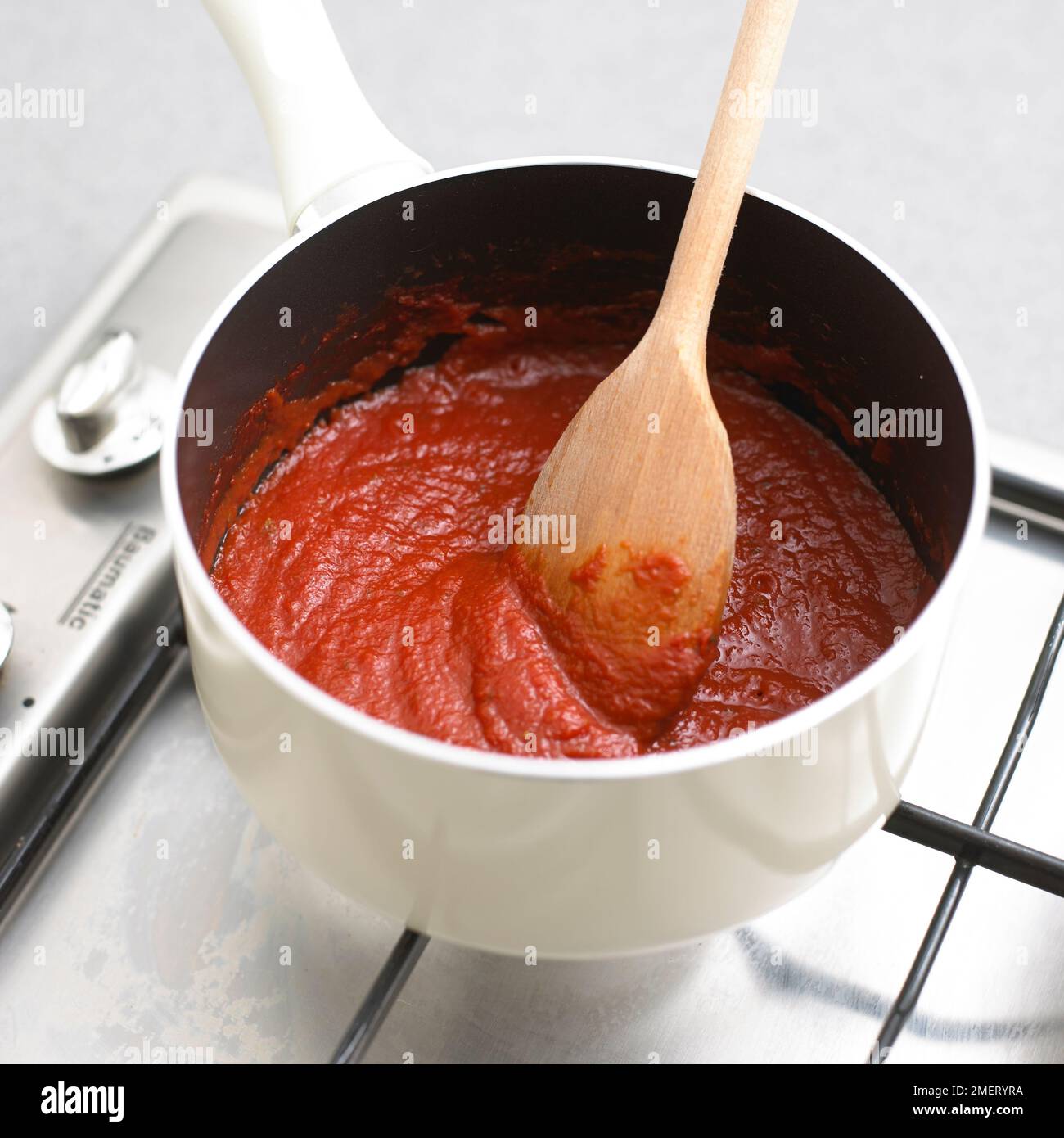 Saucepan of tomato sauce Stock Photo Alamy