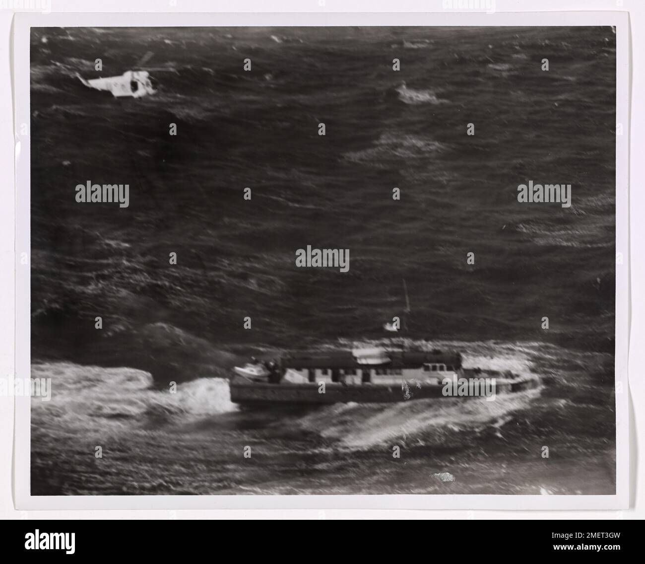 A Coast Guard helicopter rescues sailors from the vessel Hattie D ...