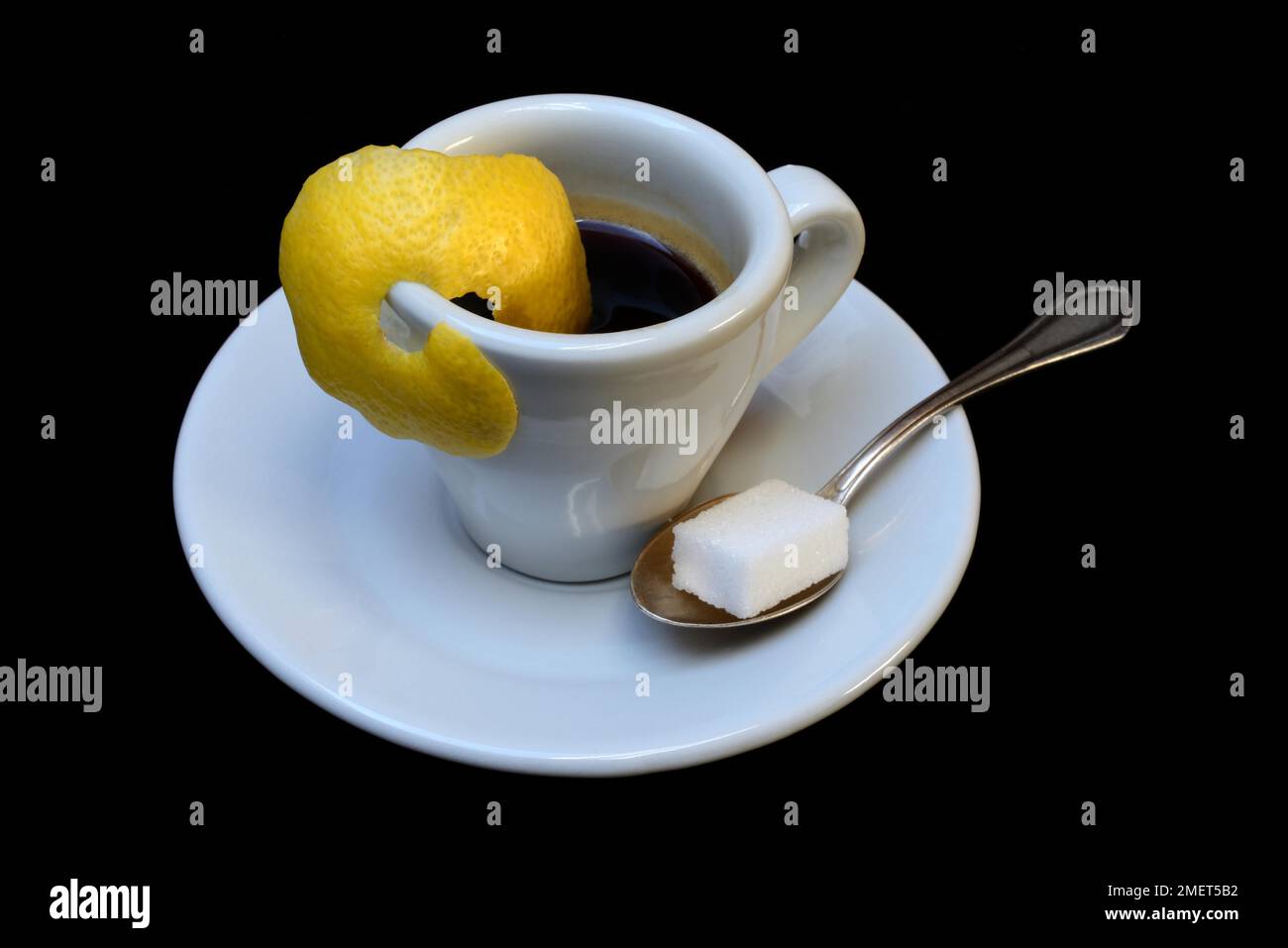 https://c8.alamy.com/comp/2MET5B2/espresso-romano-cup-of-espresso-with-lemon-zest-coffee-preparation-2MET5B2.jpg