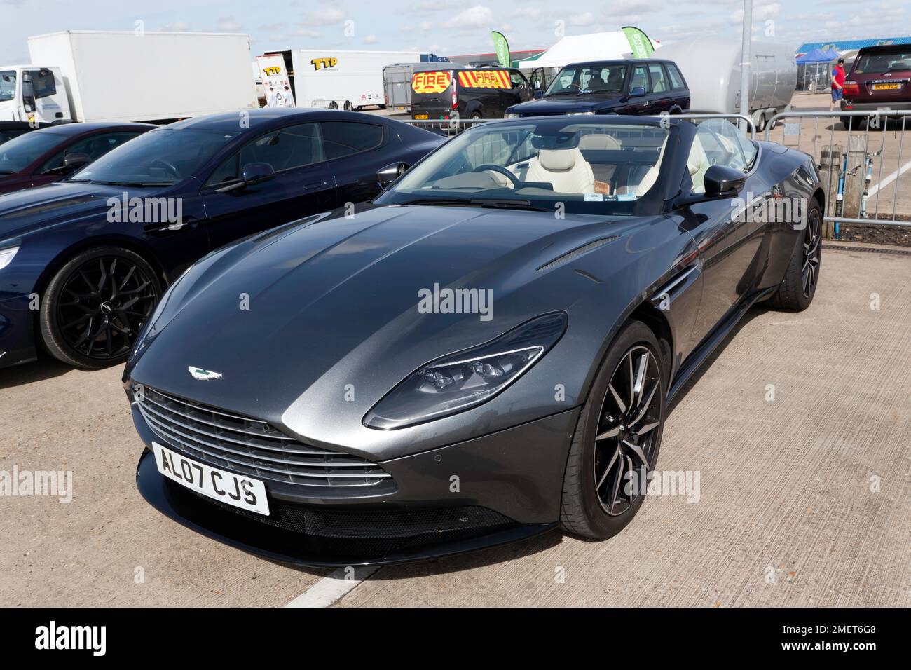 Three-quarters Front View of a Silver 2021 Aston Martin DB11 Volante, on display in the Aston Martin Owners Club zone, at the 2022 Silverstone Classic Stock Photo