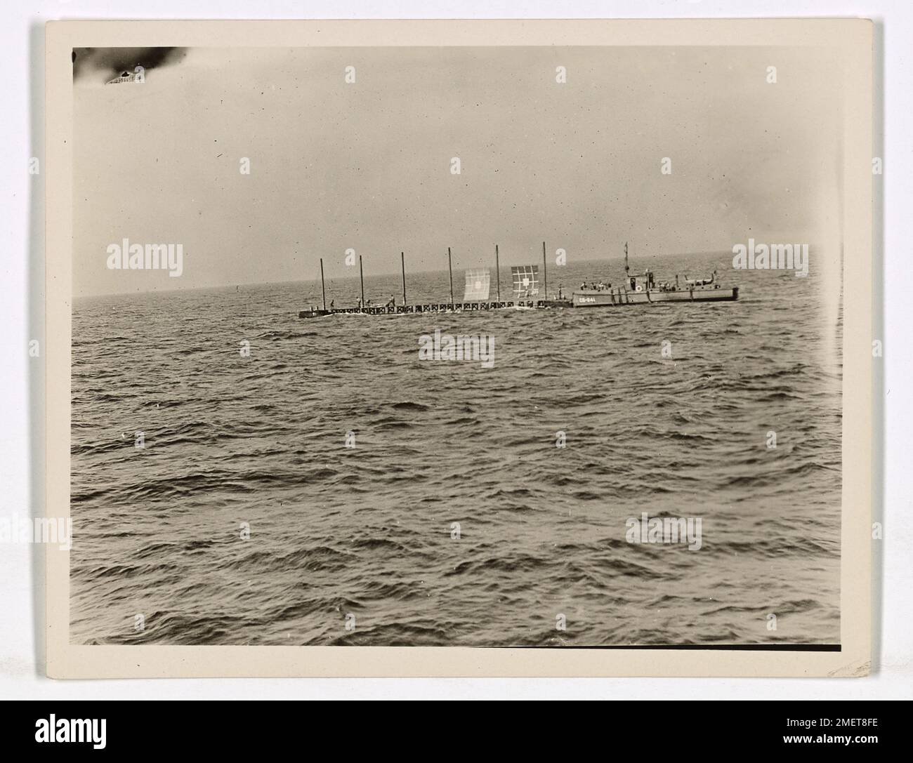 Gunnery Exercises. This image depicts a target raft off Montauk Point, New York. Short range battle practice. Stock Photo