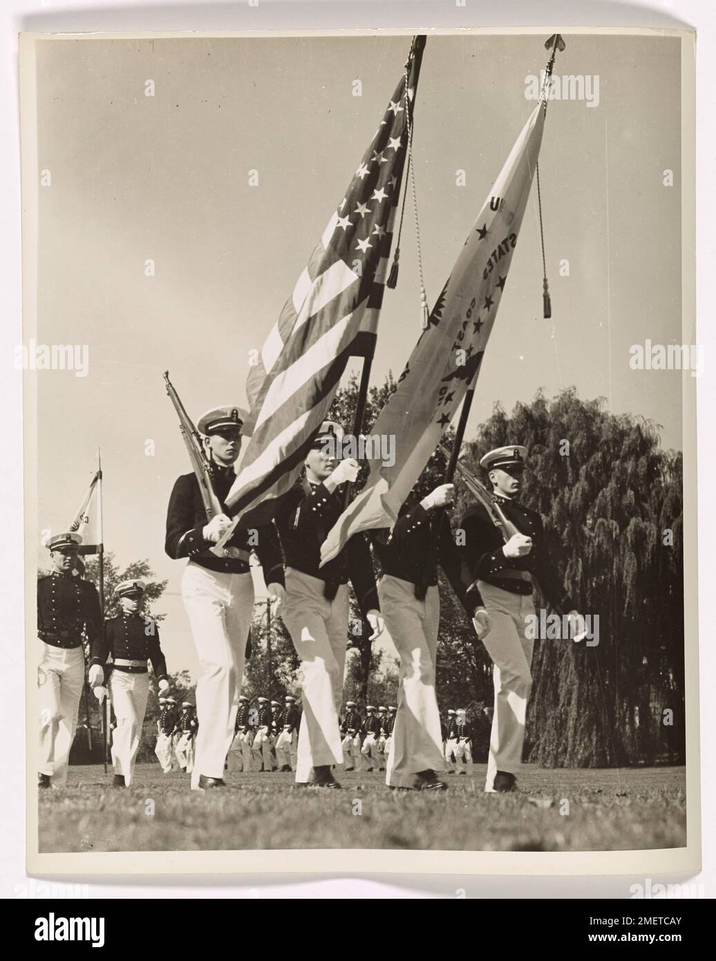 This image depicts a color guard performing at the U.S. Coast Guard ...