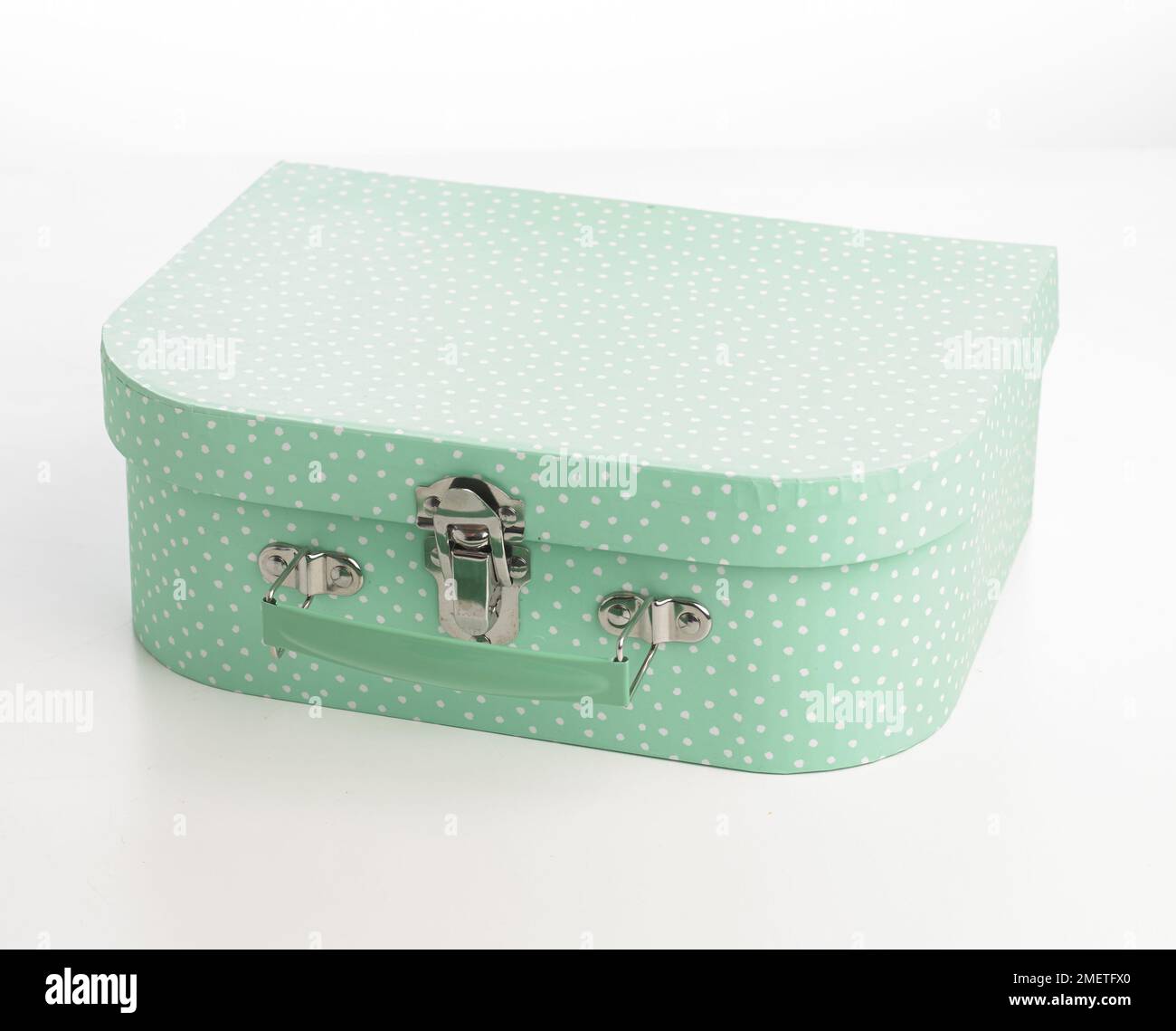 Pale green and white spotted vanity case Stock Photo