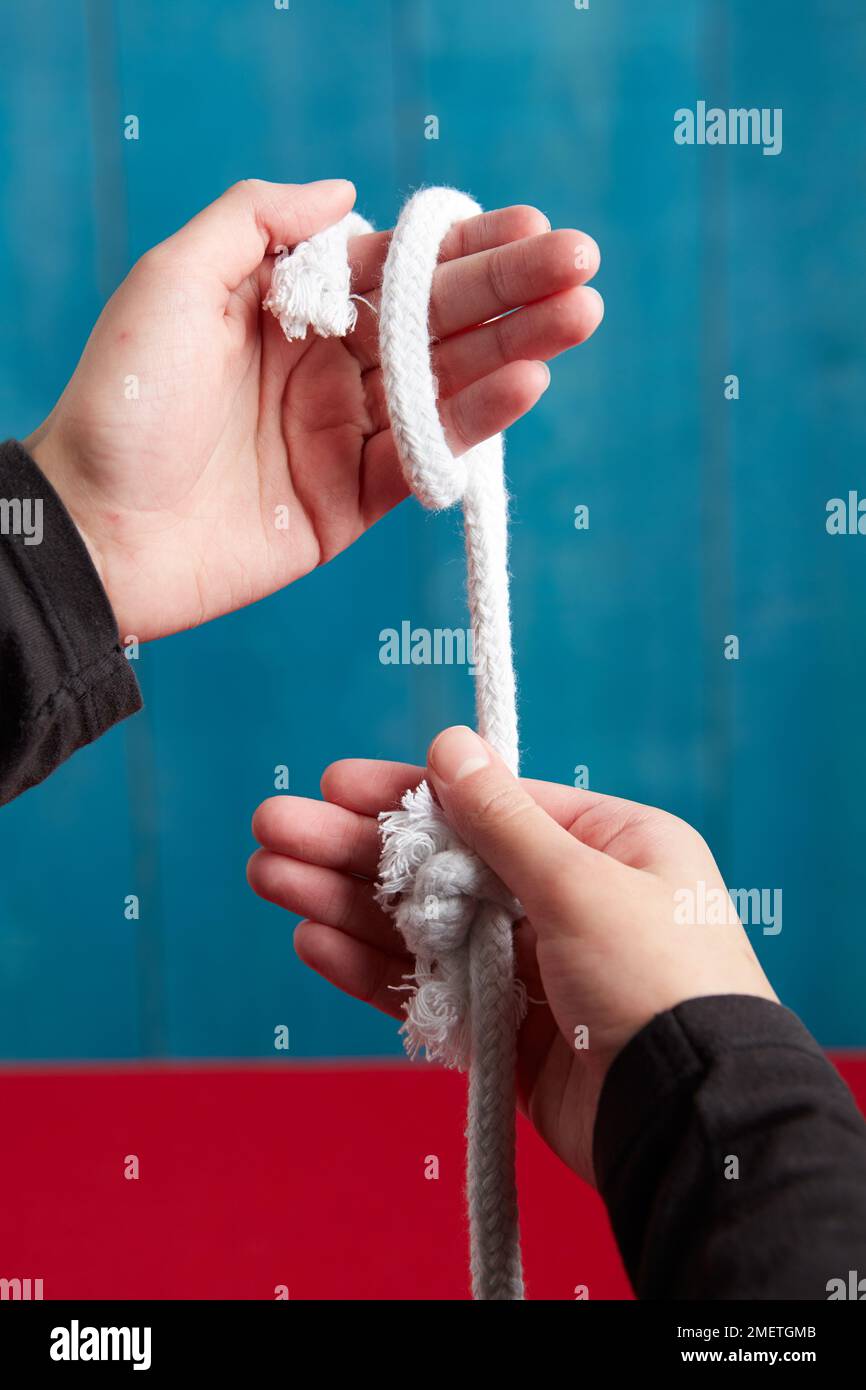Two Becomes One rope trick Stock Photo - Alamy