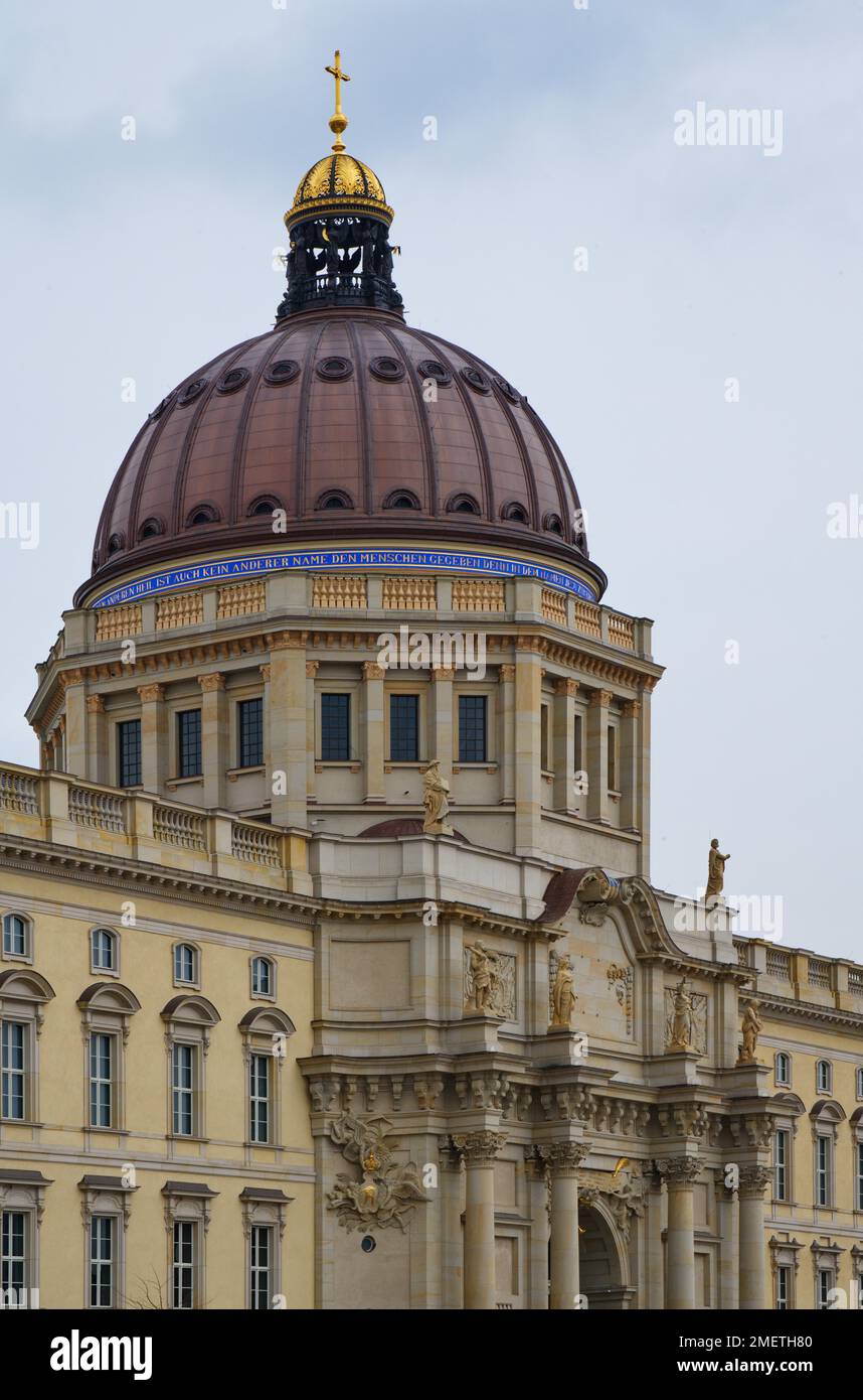 The dome of the new city palace with cross and the controversial inscription, critics see in the inscription a Christian claim of subjugation, Mitte Stock Photo
