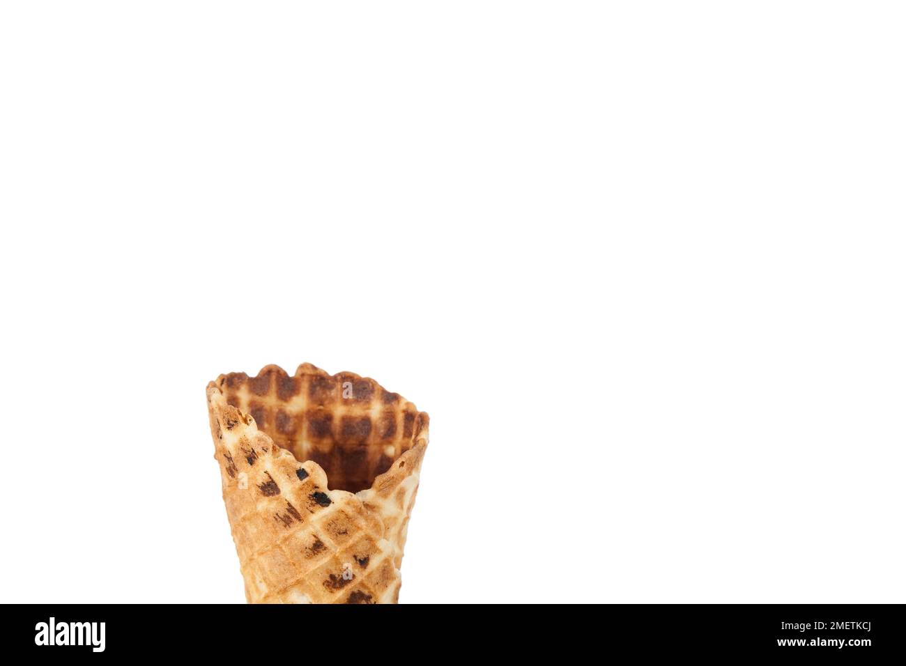 Cornet; shell for serving scoops of ice cream - photo on white background Stock Photo