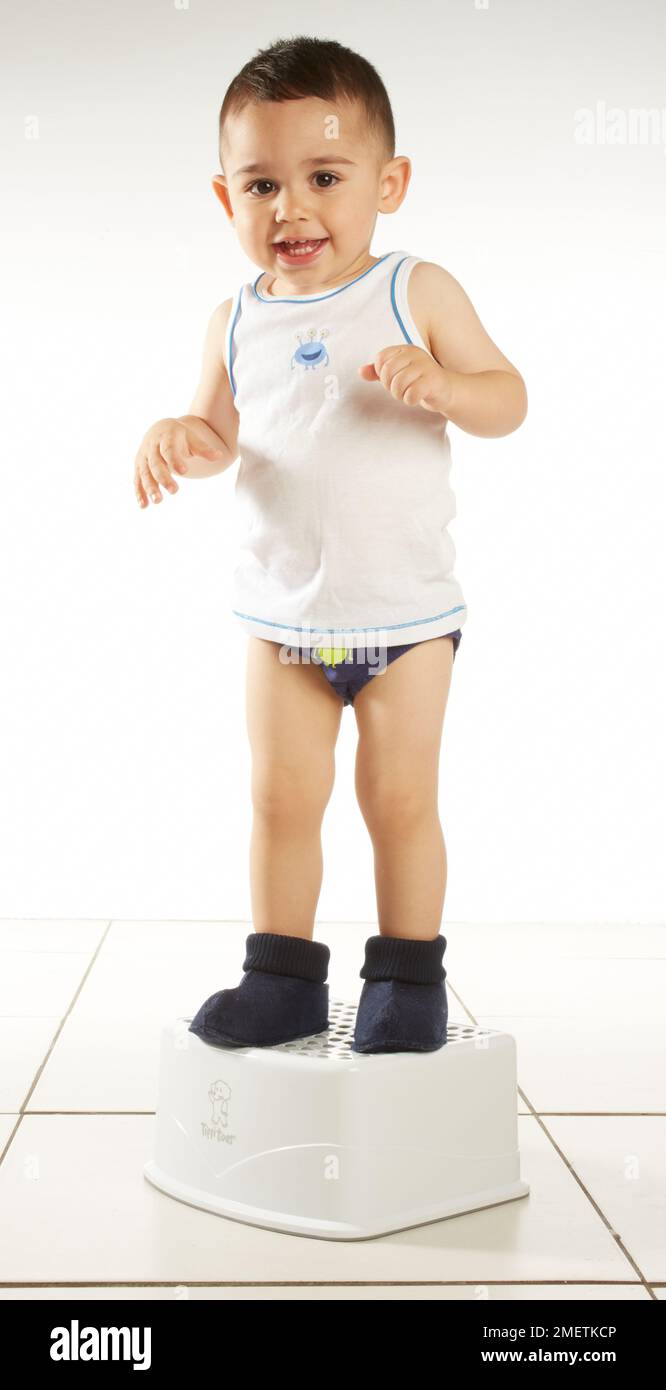 Boy stool studio hi-res stock photography and images - Alamy