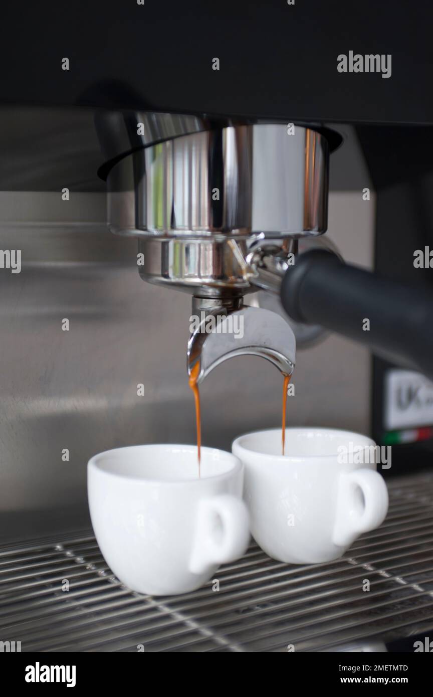 Heating up espresso coffee in a Cuban coffee maker using a mini gas stove  with a Coleman propane tank on a single burner. A thunderstorm is  approaching Stock Photo - Alamy