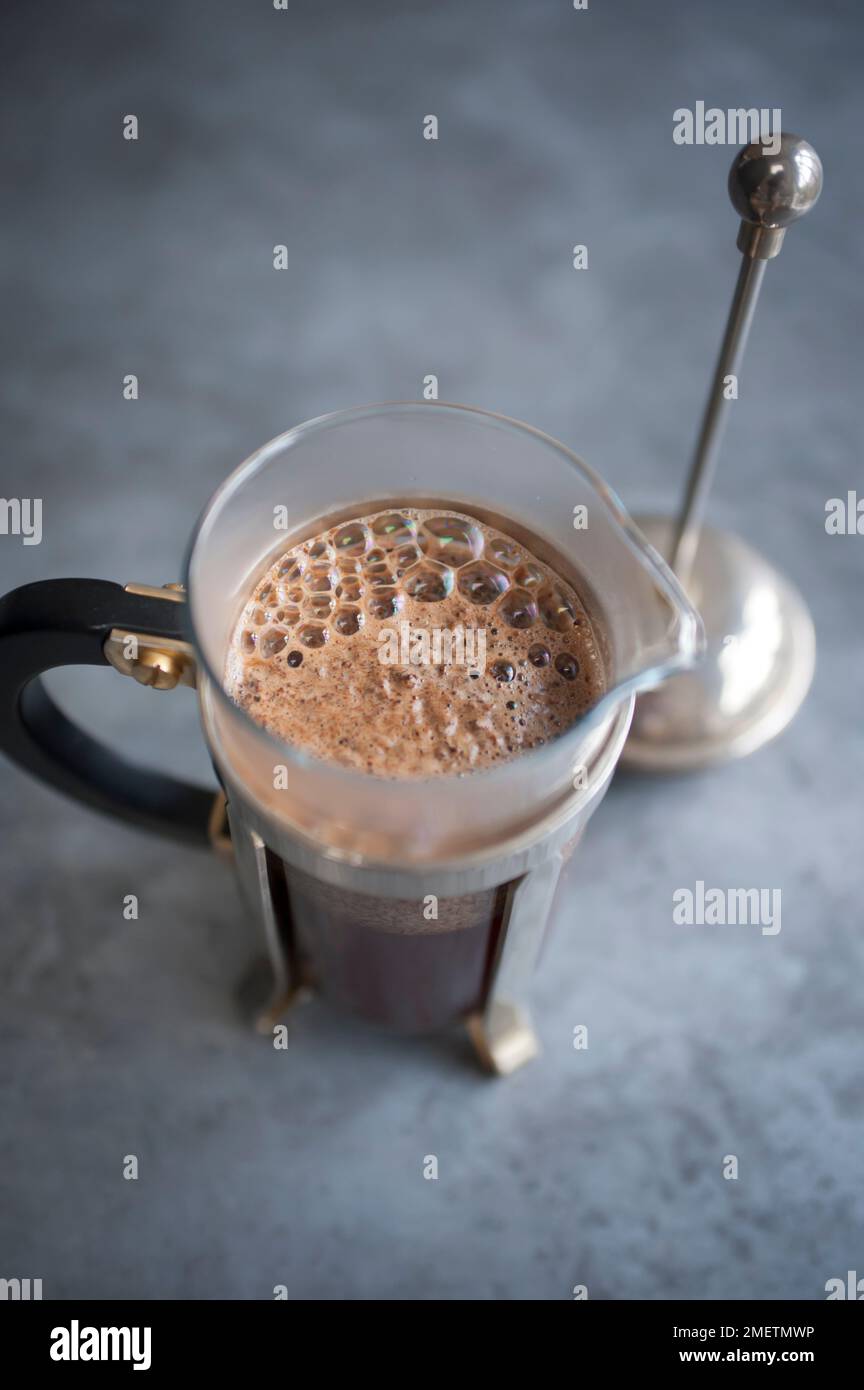 Preparing coffee in a filterstyle brewer Stock Photo Alamy