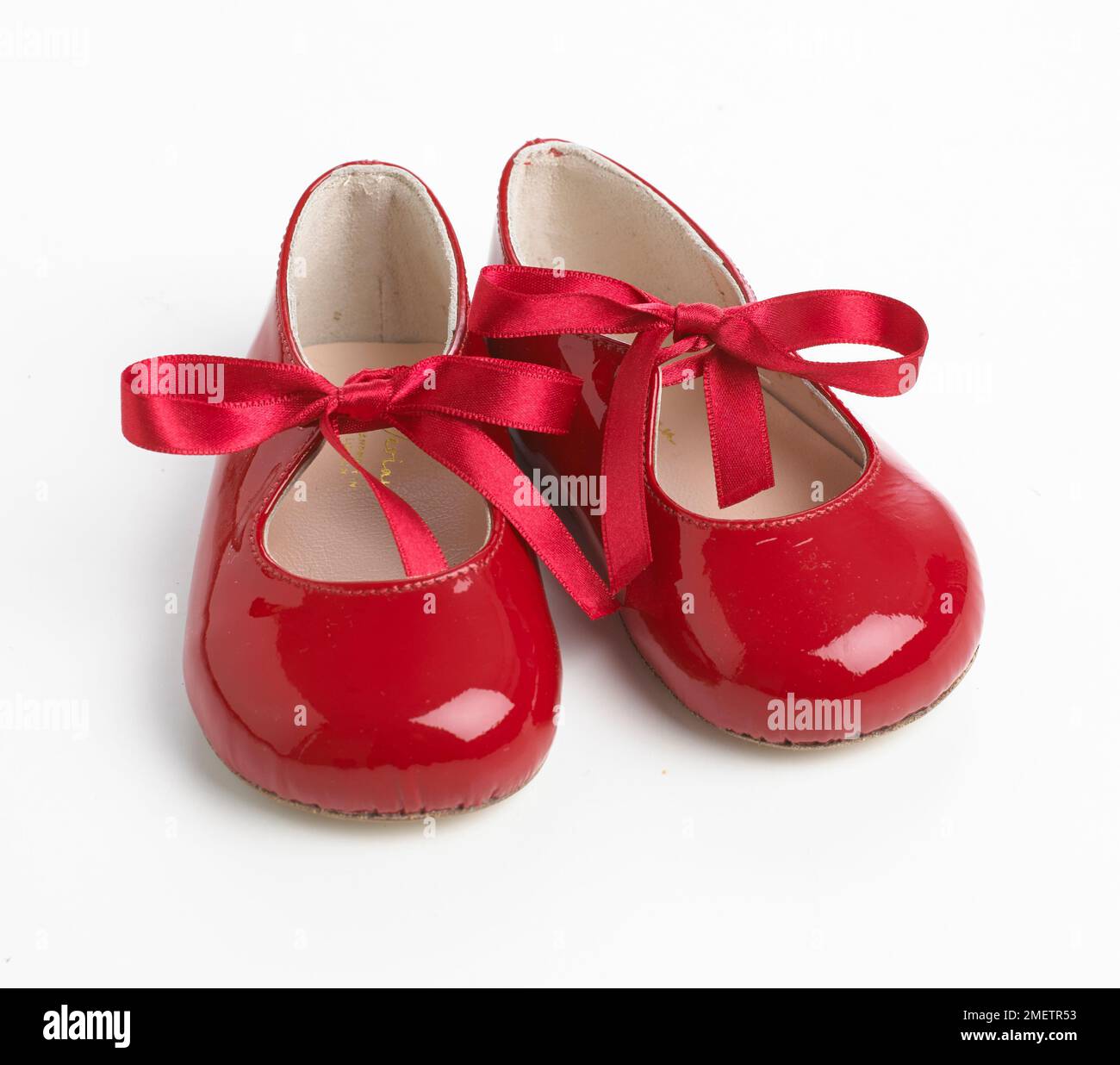 Red patent ribbon tie shoes Stock Photo