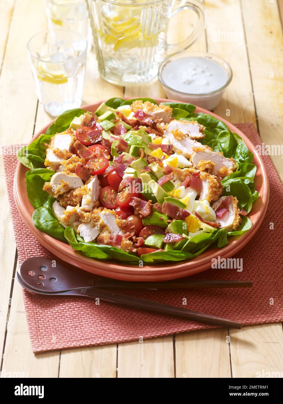 Fried chicken cobb salad, with bacon, spinach, avocado, cherry tomatoes