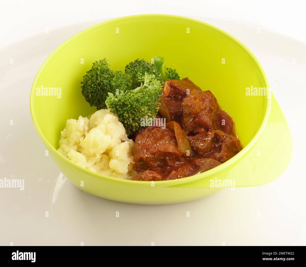 Beef goulash with broccoli and mash Stock Photo Alamy